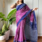 Blue Cotton MulMul Jaipuri Printed Saree with elegant traditional prints, lightweight breathable fabric, and matching blouse piece for a graceful ethnic look.