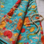 Kashmiri Georgette Sky Blue Saree With Multi Color Hand Heavy Aari Embroidery