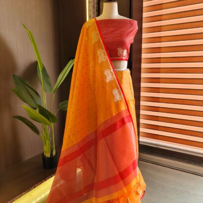 Orange & Red Raw Silk Tusser Bandhani Saree with Butti, Cow Border, Zari Pallu & Contrast Blouse