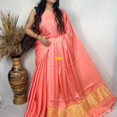 Coral Peach Modal Silk Tissue Pallu Saree with Tassels