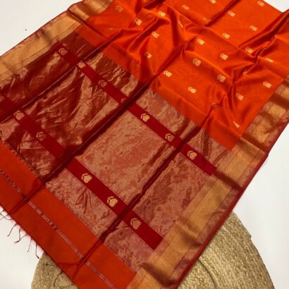 Orange Rust Maheshwari Lotus Butta Saree in soft handloom cotton silk with elegant zari border and traditional weaving design