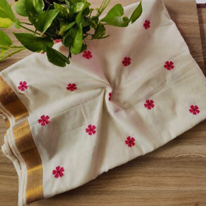 Pure Cotton Off White Saree with Golden Zari Border and Rani Pink Floral Embroidery Work