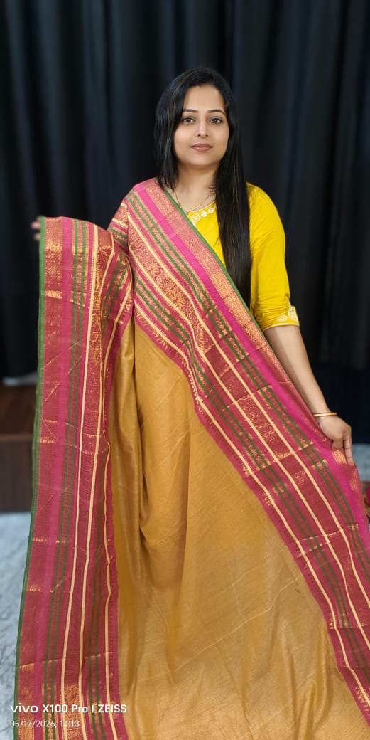 Mustard Handloom Bengal Mul Cotton Saree Premium Handloom Bengal Mul Cotton Saree in Mustard with Rani Pink Zari Border and Traditional Handloom Design