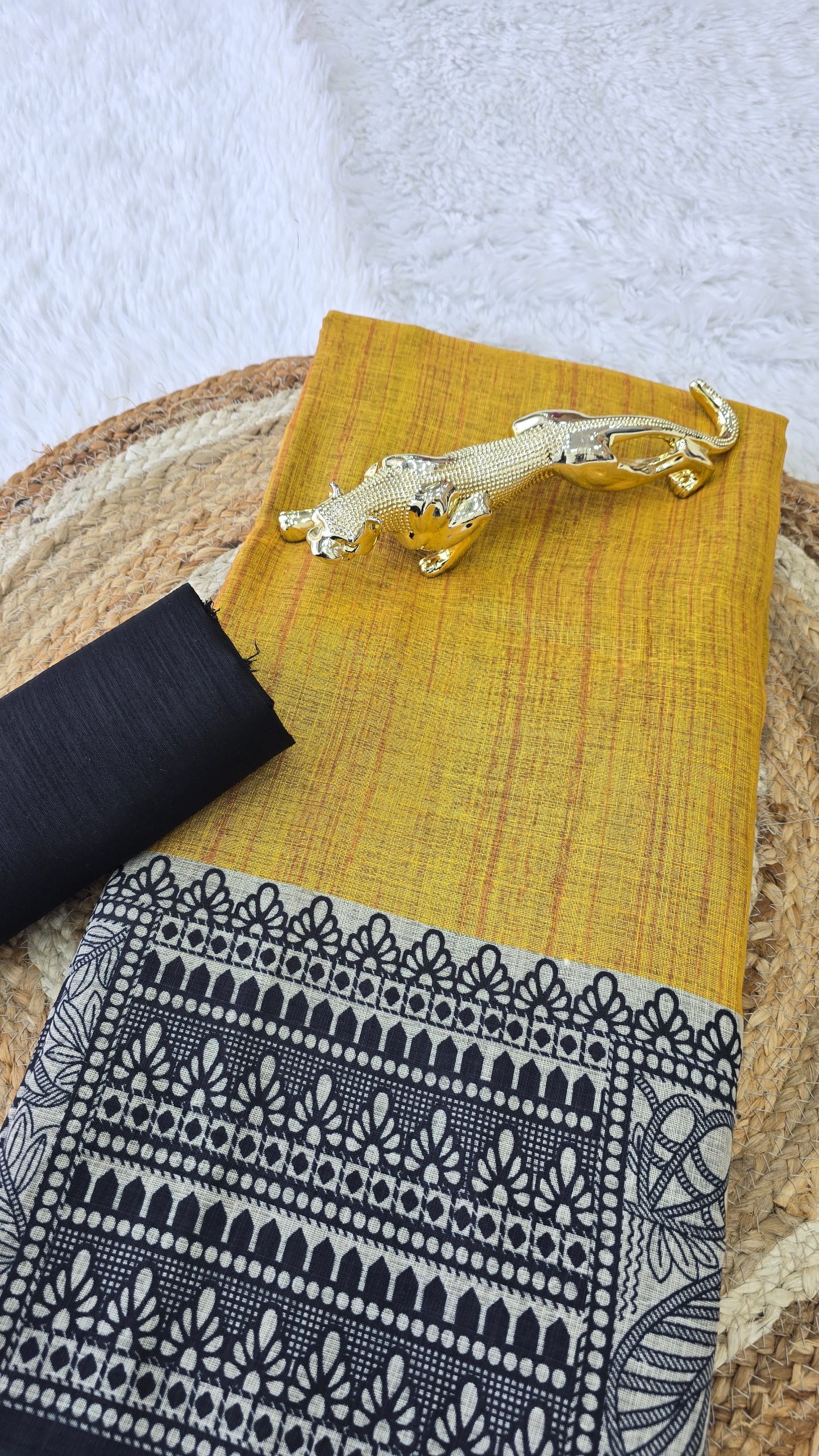 Mustard Yellow Linen Cotton Madhubani Print Saree with traditional black and beige ethnic motifs, artistic printed pallu and border, matching black blouse fabric, festive wear saree for women.