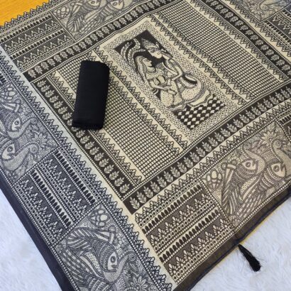 Mustard Yellow Linen Cotton Madhubani Print Saree with traditional black and beige ethnic motifs, artistic printed pallu and border, matching black blouse fabric, festive wear saree for women.