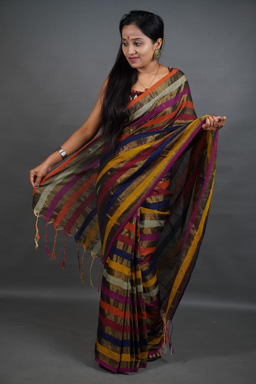 Designer Mul Cotton Tissue Saree with Multicolor Stripes, elegant all-over body striped pattern, lightweight tissue cotton fabric, festive wear saree with tassel pallu and rich traditional look.