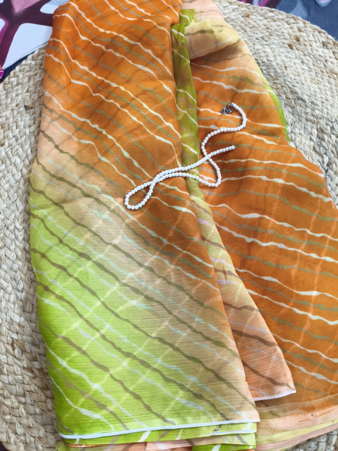 Multicolor Chiffon Saree featuring vibrant gradient shades, stylish wavy stripe pattern, lightweight flowing fabric, and graceful drape, perfect for festive wear, parties, brunch outings, and special occasions.