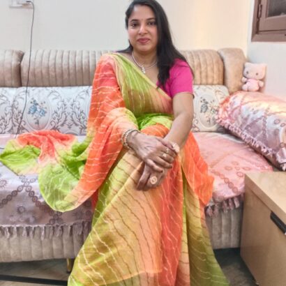 Multicolor Chiffon Saree featuring vibrant gradient shades, stylish wavy stripe pattern, lightweight flowing fabric, and graceful drape, perfect for festive wear, parties, brunch outings, and special occasions.