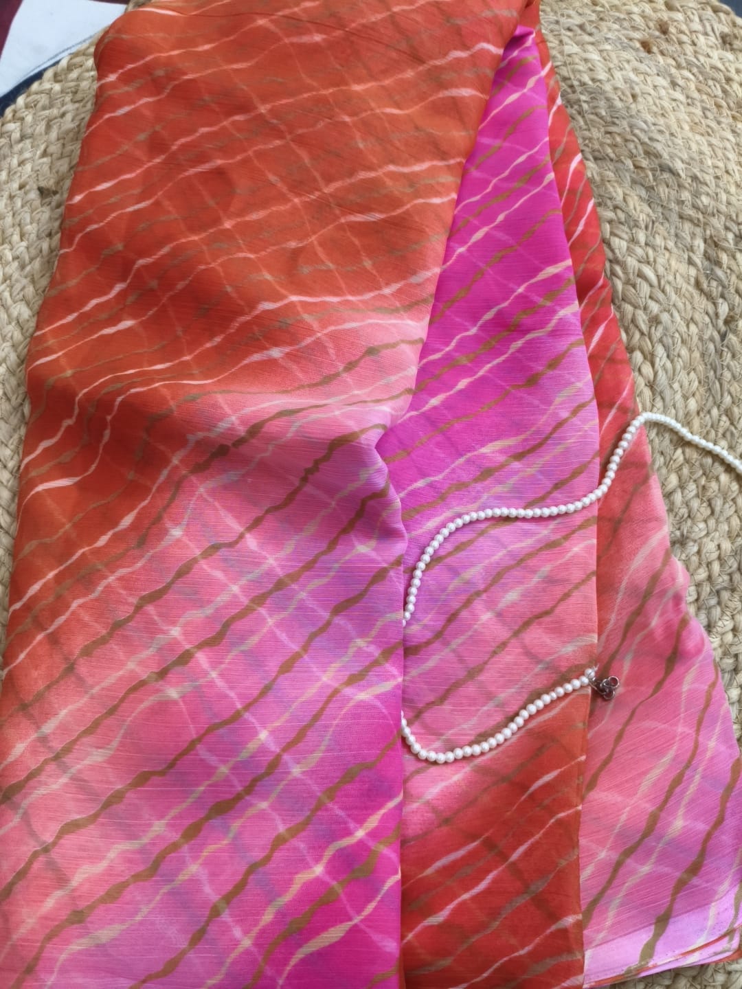 Multicolor Chiffon Saree featuring vibrant gradient shades, stylish wavy stripe pattern, lightweight flowing fabric, and graceful drape, perfect for festive wear, parties, brunch outings, and special occasions.