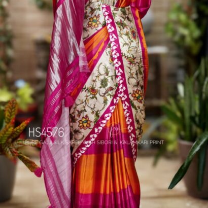 Pure Gajji Silk Saree with Kalamkari floral print, vibrant orange and rani pink Sibori design, Khaddi zari pallu, and elegant traditional festive wear look.