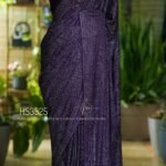 Purple Satin Silk Saree with Swarovski Work featuring a luxurious glossy finish, elegant drape, sparkling embellishments, and matching bordered blouse for partywear and wedding occasions.