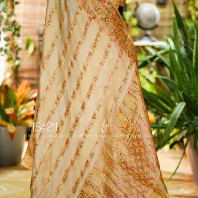 Cream Multicolor Satin Organza Silk Saree with sunset stripe pattern, rangkat dyeing, brocade border, woven buties and elegant pastel gradient design.