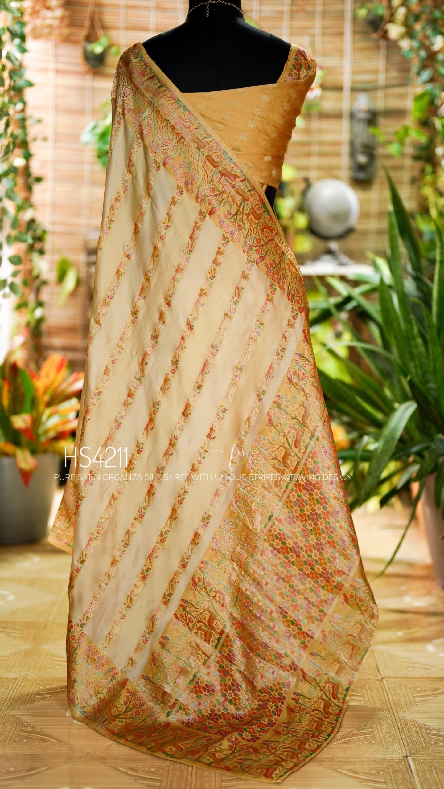 Cream Multicolor Satin Organza Silk Saree with sunset stripe pattern, rangkat dyeing, brocade border, woven buties and elegant pastel gradient design.