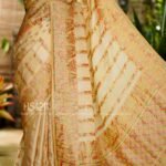 Cream Multicolor Satin Organza Silk Saree with sunset stripe pattern, rangkat dyeing, brocade border, woven buties and elegant pastel gradient design.