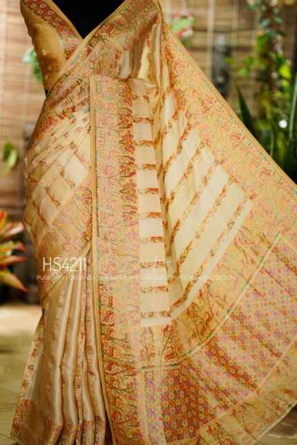 Cream Multicolor Satin Organza Silk Saree with sunset stripe pattern, rangkat dyeing, brocade border, woven buties and elegant pastel gradient design.