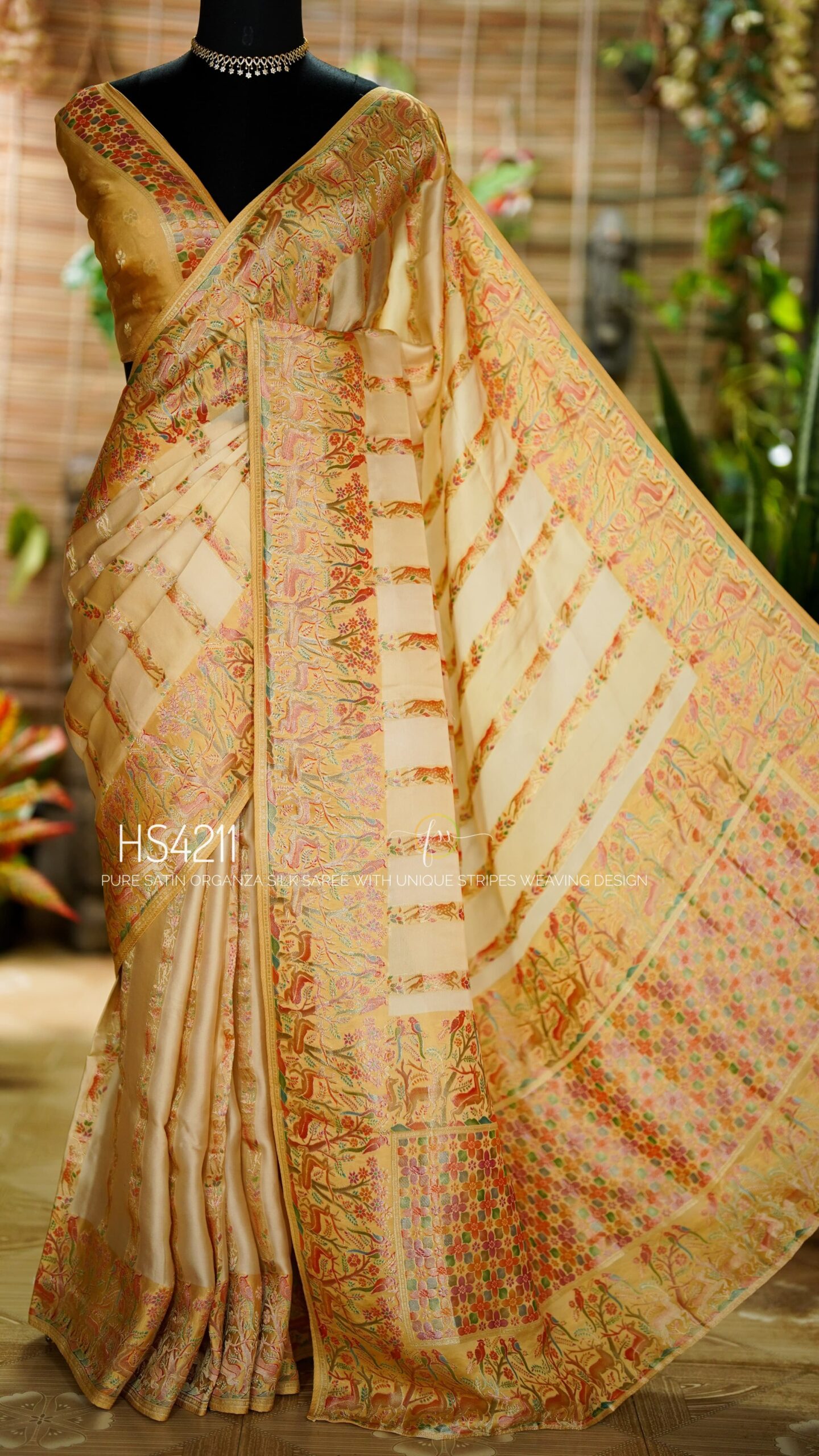 Cream Multicolor Satin Organza Silk Saree with sunset stripe pattern, rangkat dyeing, brocade border, woven buties and elegant pastel gradient design.