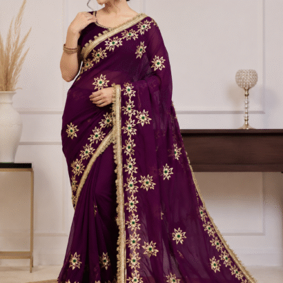 Wine Georgette Gota Patti Saree adorned with elegant gold gota work, designer border, matching blouse, ideal for weddings and festive events.