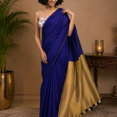 Royal Blue and Antique Gold Sico Khadi Cotton Saree with contrast blouse piece, matching tassel pallu, soft lightweight fabric, elegant traditional ethnic wear for women.