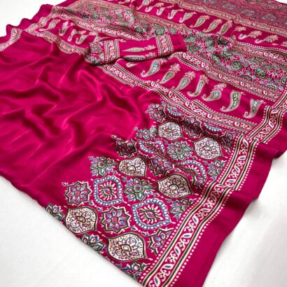 Ajrakh Satin Silk Saree in premium Modal Satin Silk with elegant digital print, tassels on pallu, 6.3 meter saree with matching blouse piece for festive and party wear.