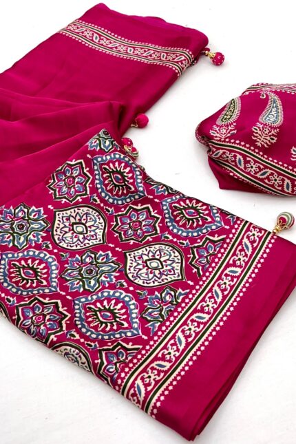 Rani Pink Ajrakh Satin Silk Saree in premium Modal Satin Silk with elegant digital print, tassels on pallu, 6.3 meter saree with matching blouse piece for festive and party wear.
