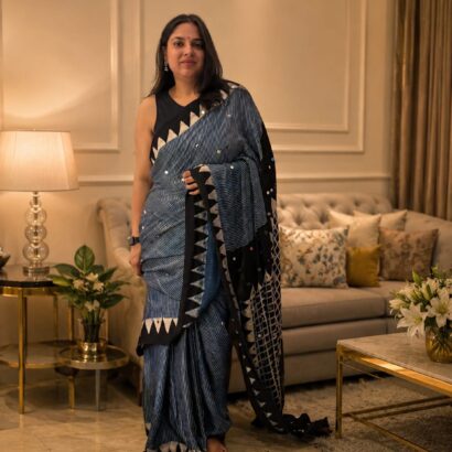 Pure Modal Silk Saree in Navy Blue with natural dye hand block print, 500 hand-pasted mirror work, striped design and designer pallu for festive, wedding and party wear.