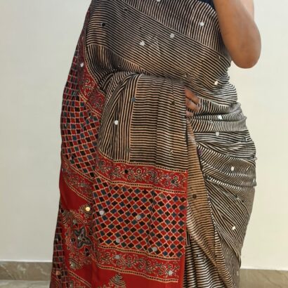 Pure Modal Silk Saree in Beige with natural dye hand block print, 500 hand-pasted mirror work, striped design and designer pallu for festive, wedding and party wear.