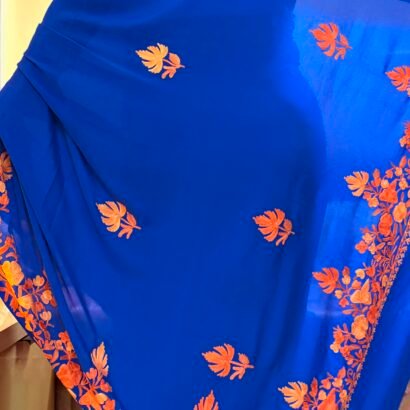 Blue Kashmiri silk saree with intricate handcrafted Aari Resham border embroidery and matching blouse piece.