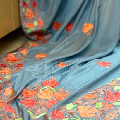 Dusty Blue Kashmiri Silk Saree featuring authentic Aari Resham border embroidery and running blouse piece.
