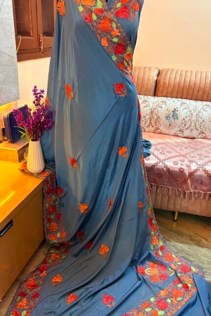 Dusty Blue Kashmiri Silk Saree featuring authentic Aari Resham border embroidery and running blouse piece.
