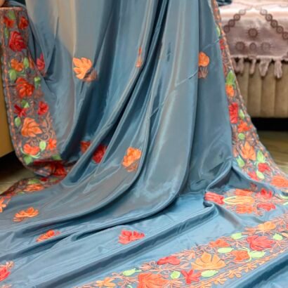 Dusty Blue Kashmiri Silk Saree featuring authentic Aari Resham border embroidery and running blouse piece.