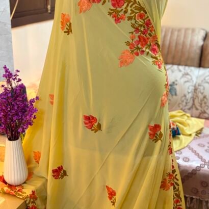 Yellow Kashmiri Silk Saree with Aari Resham embroidery featuring authentic Aari Resham border embroidery and running blouse piece.