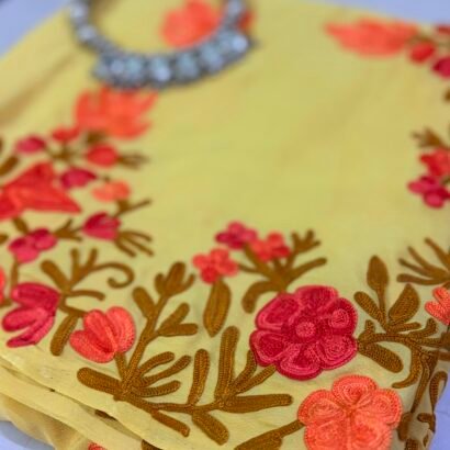 Yellow Kashmiri Silk Saree with Aari Resham embroidery featuring authentic Aari Resham border embroidery and running blouse piece.