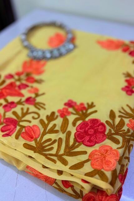 Yellow Kashmiri Silk Saree with Aari Resham embroidery featuring authentic Aari Resham border embroidery and running blouse piece.