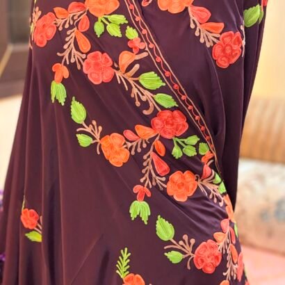Wine purple Kashmiri silk saree featuring authentic Aari Resham border embroidery and running blouse piece.