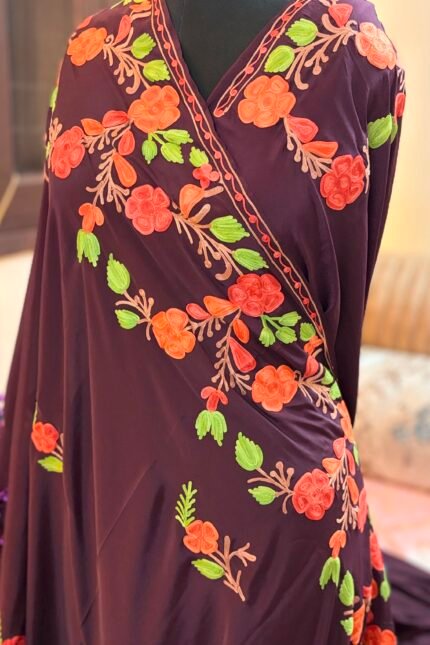 Wine purple Kashmiri silk saree featuring authentic Aari Resham border embroidery and running blouse piece.