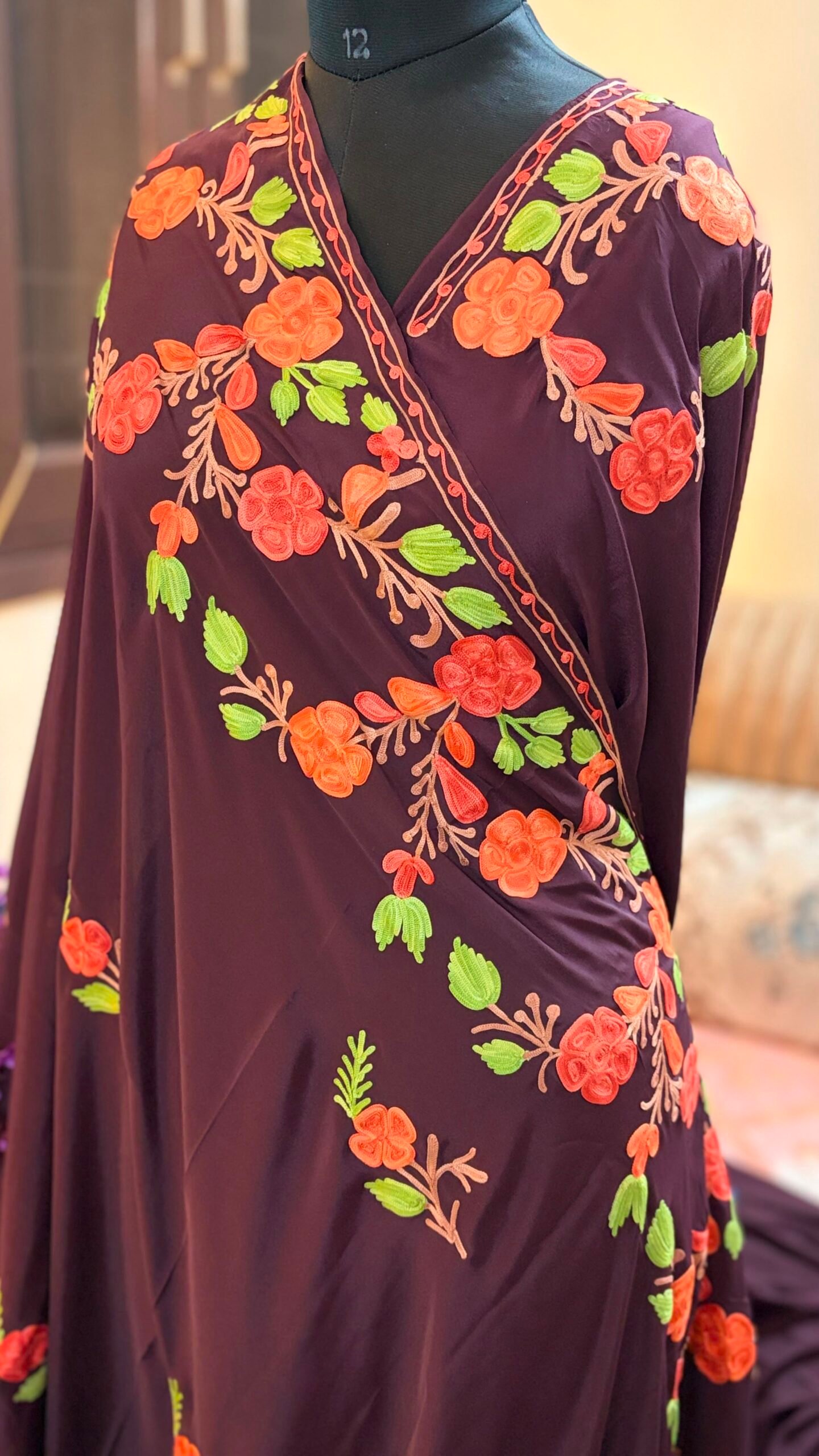Wine purple Kashmiri silk saree featuring authentic Aari Resham border embroidery and running blouse piece.