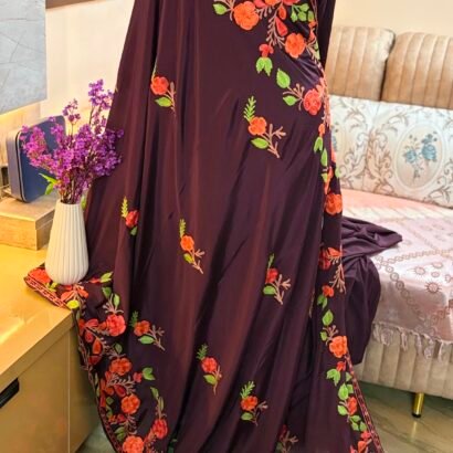 Wine purple Kashmiri silk saree featuring authentic Aari Resham border embroidery and running blouse piece.