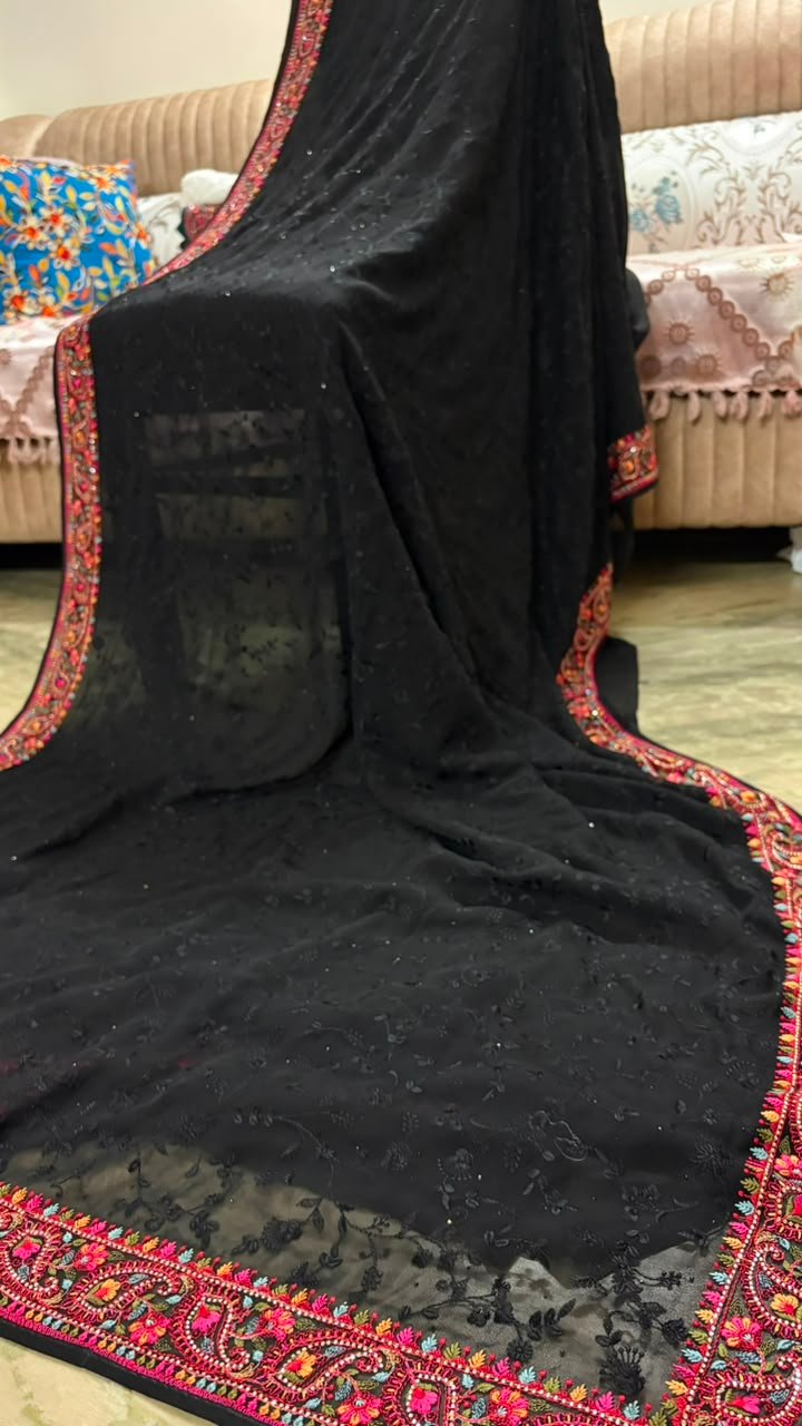 Black pure georgette saree with intricate Kashmiri border and Chikankari embroidery body