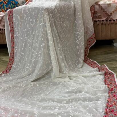 White pure georgette saree with intricate Kashmiri border and Chikankari embroidery body