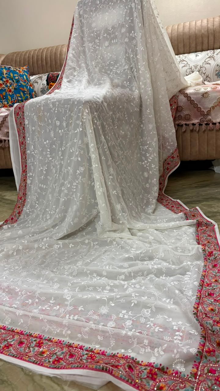 White pure georgette saree with intricate Kashmiri border and Chikankari embroidery body