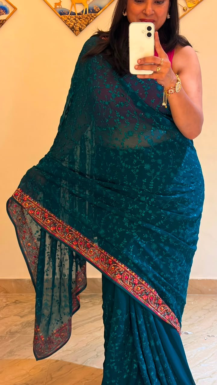 Teal Blue pure georgette saree with intricate Kashmiri border and Chikankari embroidery body