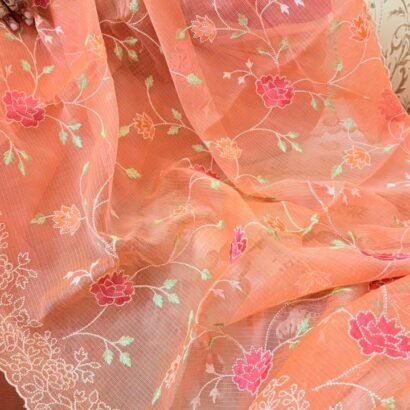 Peach Kota Doria saree with floral Parsi embroidery