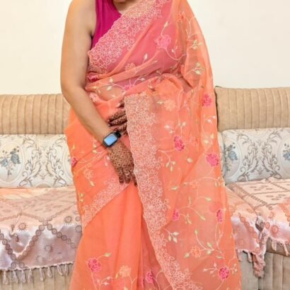 Peach Kota Doria saree with floral Parsi embroidery