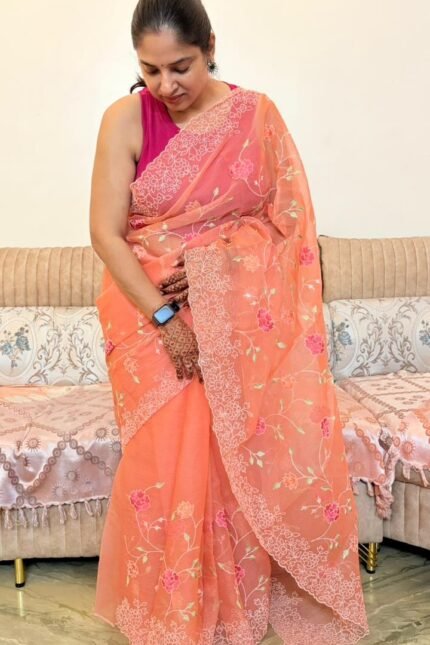 Peach Kota Doria saree with floral Parsi embroidery