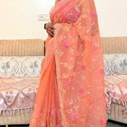 Peach Kota Doria saree with Parsi embroidery,