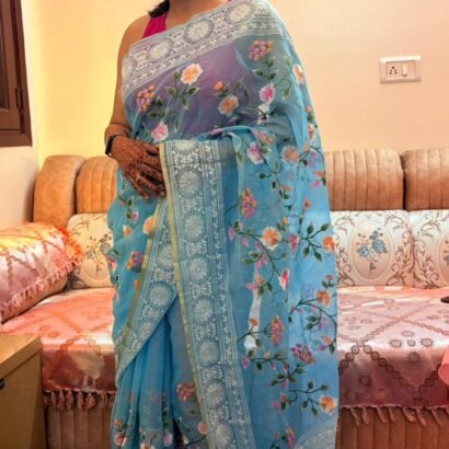 Kota Doria Saree Sky Blue Color with floral Parsi embroidery and white border