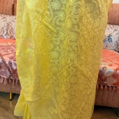 Yellow Kota Doria Saree with floral Parsi embroidery and white border