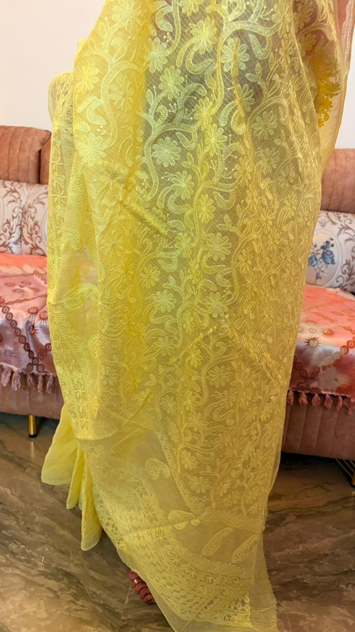 Yellow Kota Doria Saree with floral Parsi embroidery and white border