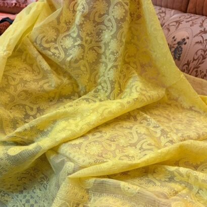 Yellow Kota Doria Saree with floral Parsi embroidery and white border