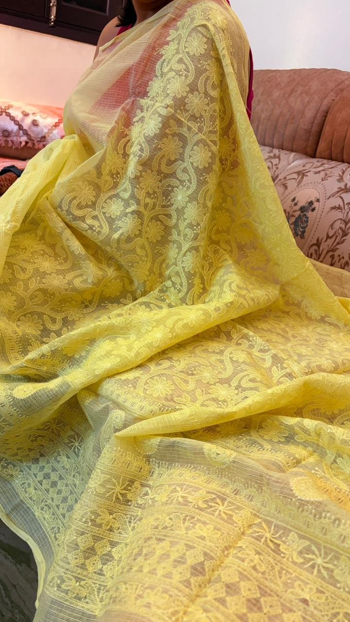 Yellow Kota Doria Saree Yellow Kota Doria Saree with floral Parsi embroidery and white border